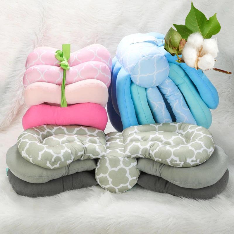 Coussin d'allaitement CoconConfort™ disponible en rose, bleu et gris — housse coton doux